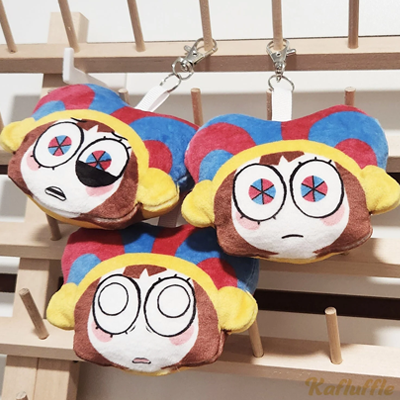 Plush keychain of Pomni with multiple expressions