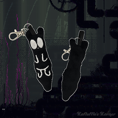 A plush keychain of the slugcat watcher